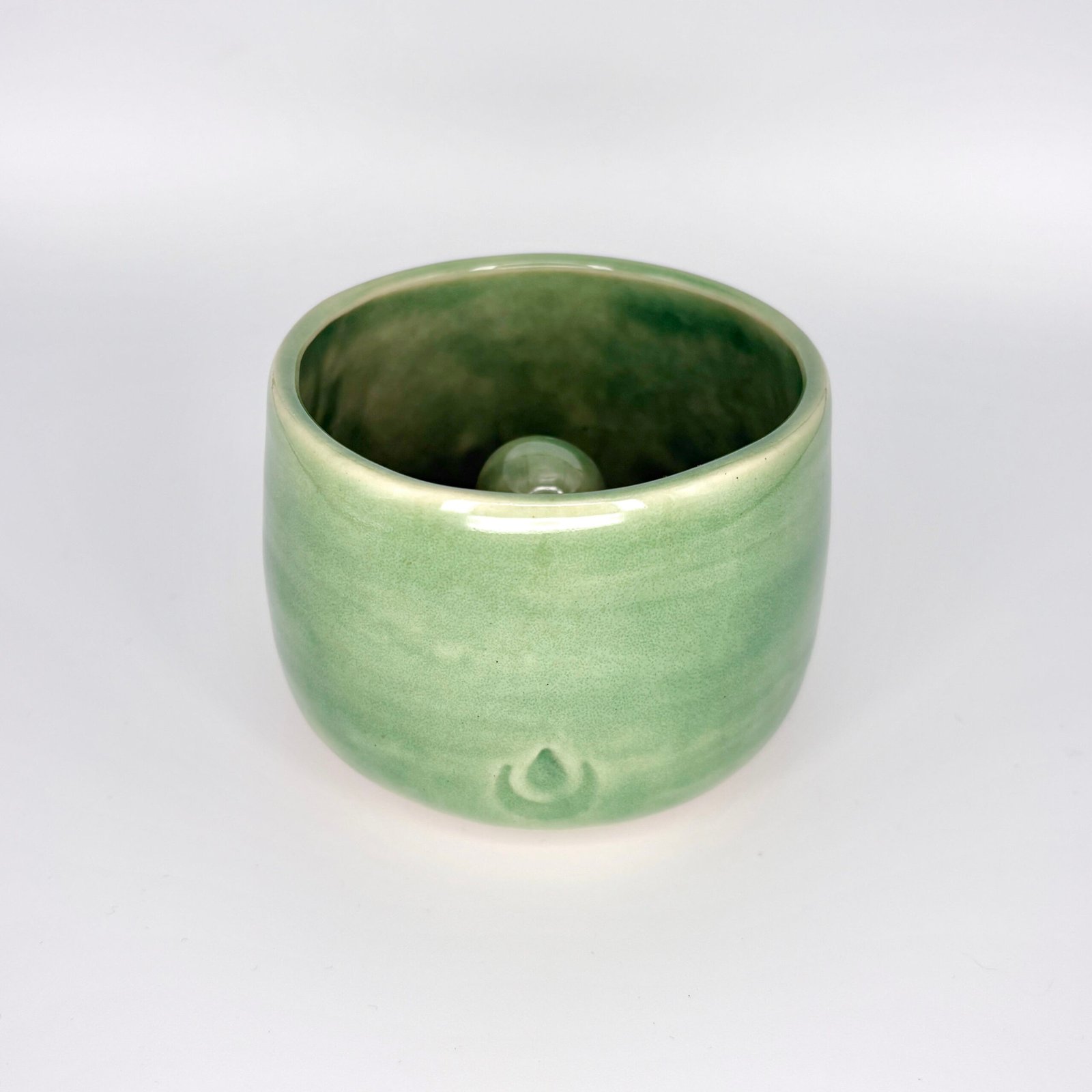 Vera Style Moona Stone cup and disc holder in the color Jade Green